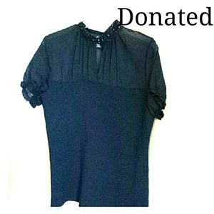 Short sleeve black top with sheer and bead detail